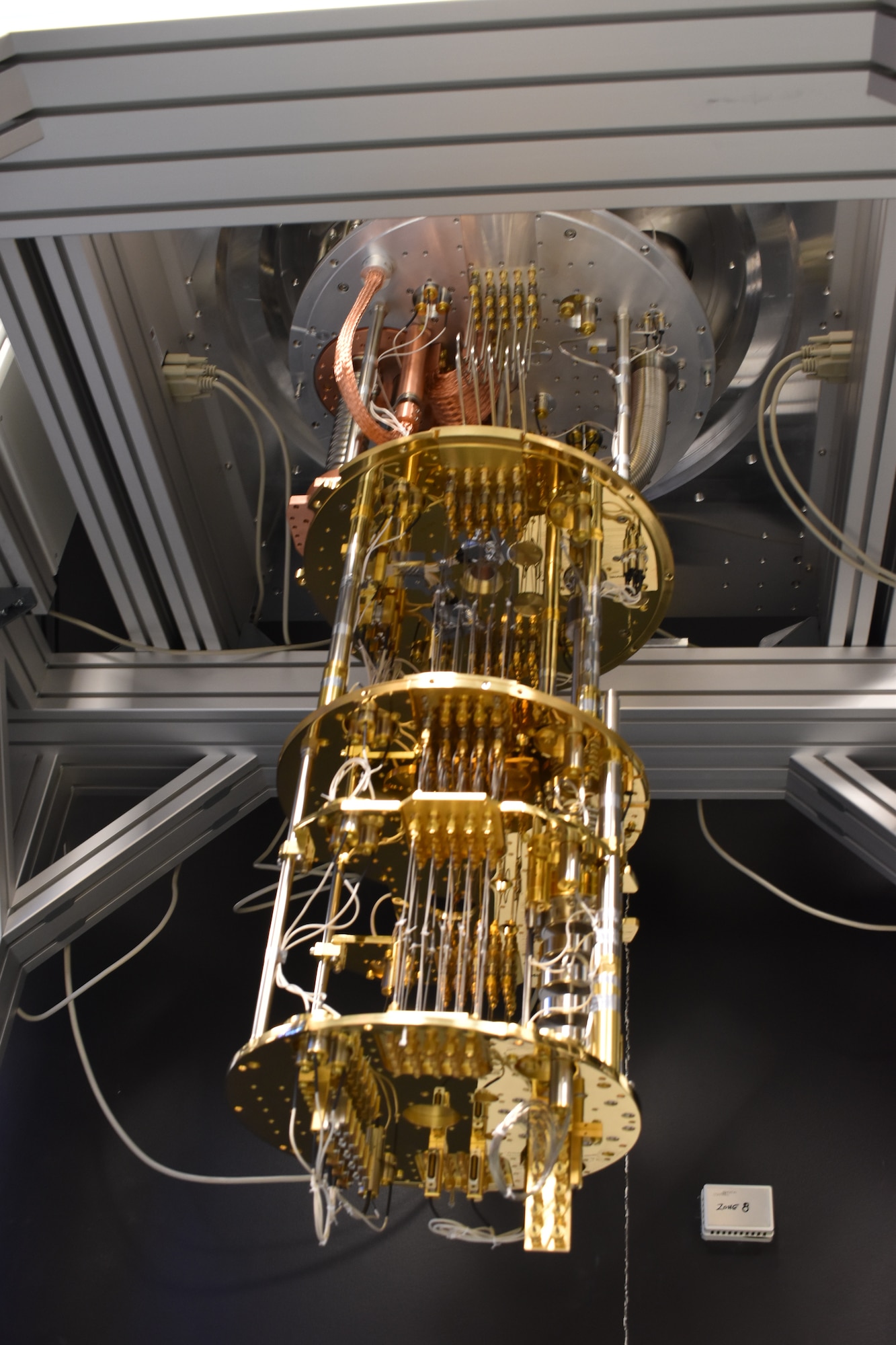 A cryogenic refrigerator installed in the Quantum Information and Sciences Laboratory at AFRL’s Information Directorate in Rome, New York. The device is used by AFRL researchers to measure the energy and coherence times of superconducting quantum bits (qubits), two important characteristics that determine how long qubits can retain quantum information. (Courtesy photo)