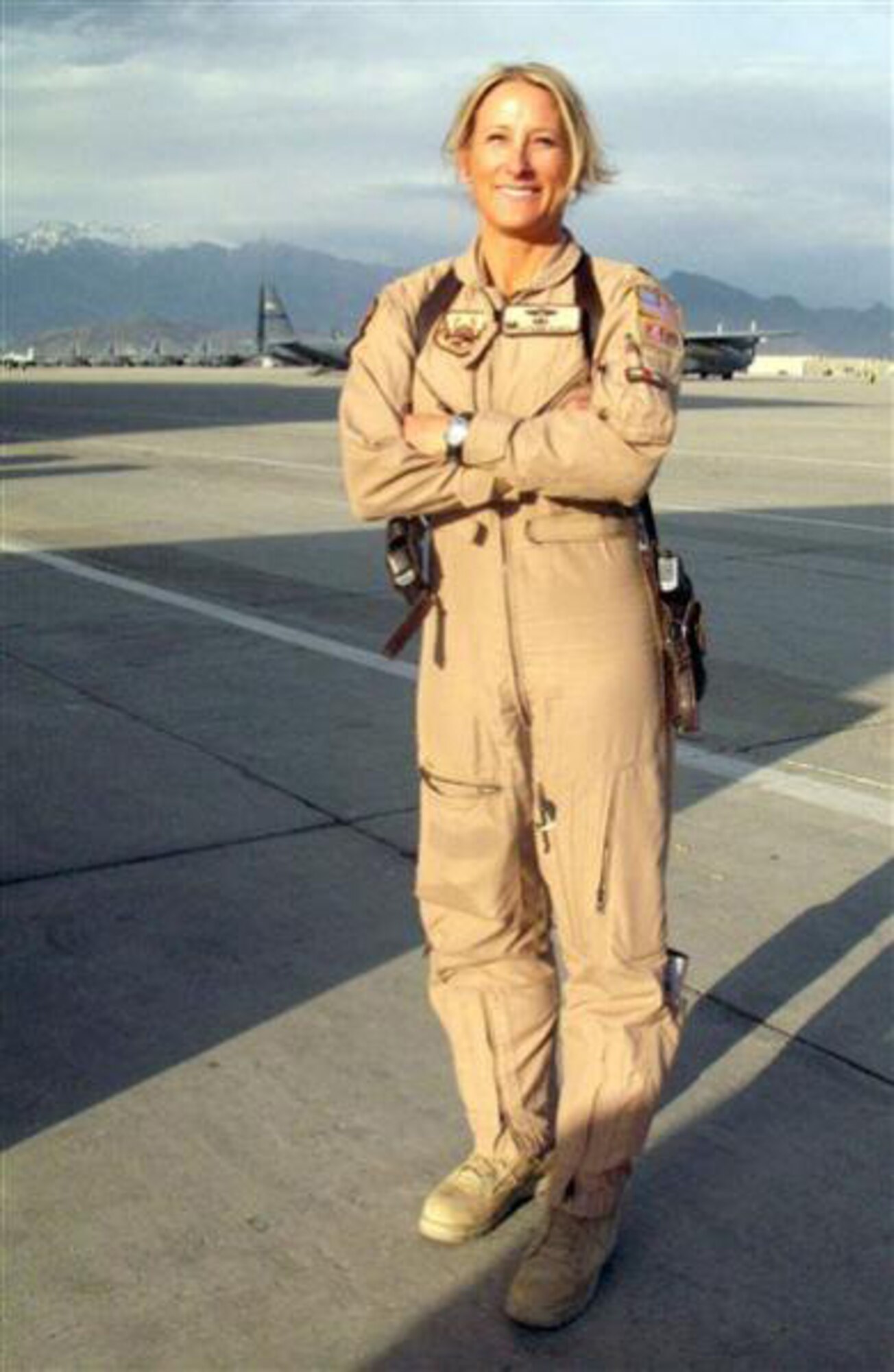Col. Kathleen Flarity, 34th Aeromedical Evacuation Squadron commander, stands on the flightline of an undisclosed location in South Asia in May 2011.