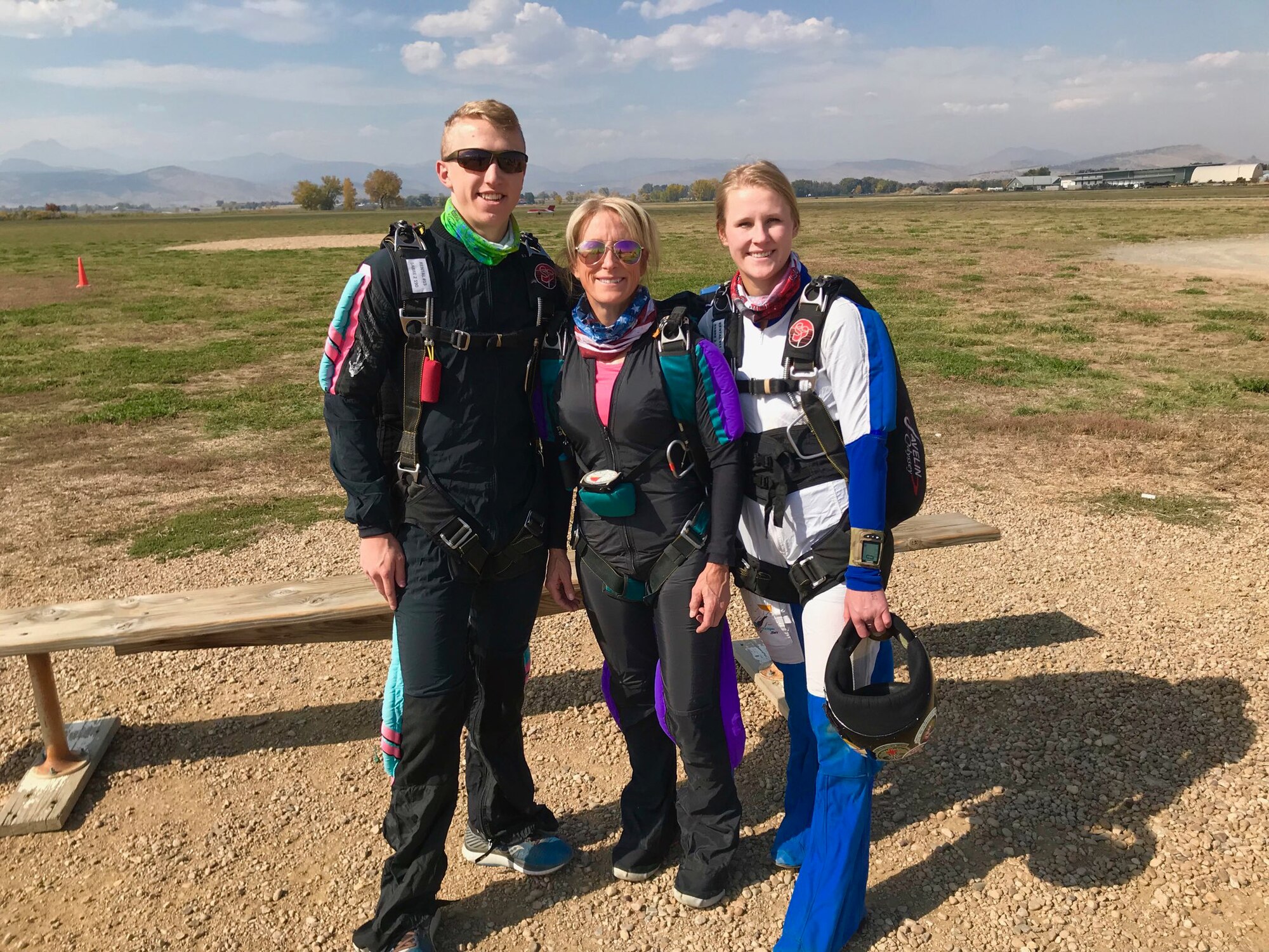 Brig. Gen. Kathleen Flarity, mobilization assistant to the command surgeon, Air Mobility Command (center), poses for a photo with her son, Patrick, and daughter, Tori, before a skydiving jump.