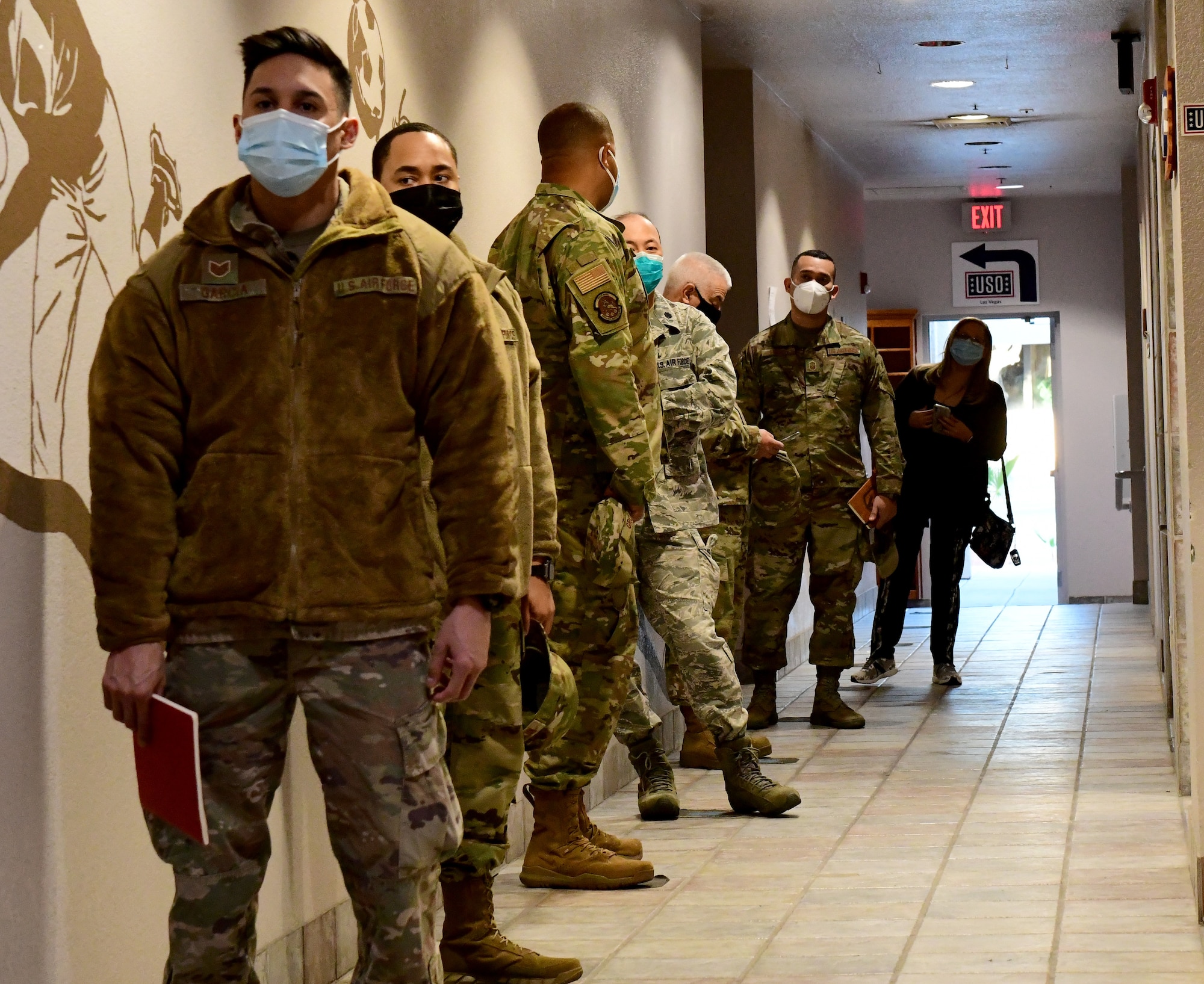 Members of the 926th Wing wait to receive their first dose of the COVID-19 vaccination during the Unit Training Assembly, Jan. 9, at Nellis Air Force Base, Nevada. (U.S. Air Force Photo by Staff Sgt. Lorna Booze)