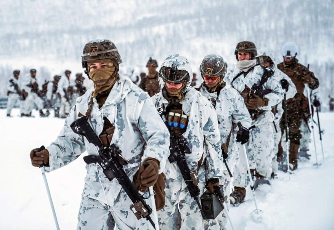 In a Nov. 20, 2020 photo, Marines with Marine Rotational Force-Europe 21.1, Marine Forces Europe and Africa, hike through snow during a cold-weather live-fire training event in preparation for Exercise Reindeer II in Setermoen, Norway. More than 1,000 Marines from Camp Lejeune, N.C., arrived in Norway in Jan. 2021 to build winter warfare skills. WILLIAM CHOCKEY/U.S. MARINE CORPS