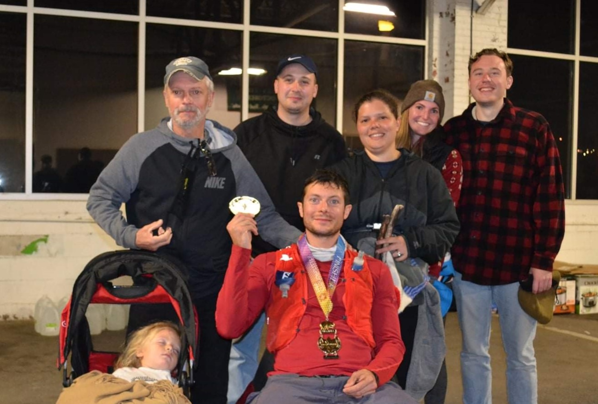 Celebratory photo after Capt. Kyle Imhoff finishes his first 100-mile ultramarathon.