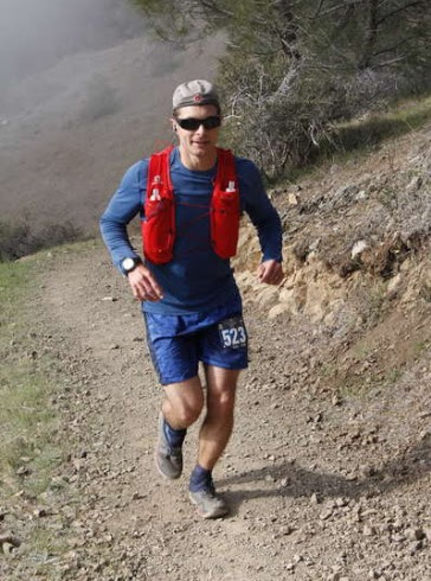 Capt. Kyle Imhoff runs a trail during a race.