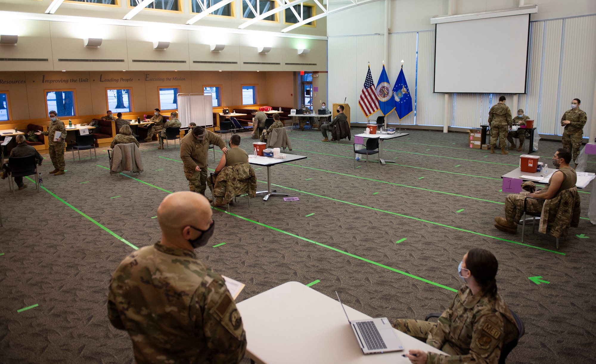 U.S. Air Force Airmen from the 133rd Airlift Wing received their first dose of the Moderna COVID-19 vaccine in St. Paul, Minn., Jan. 8, 2021.