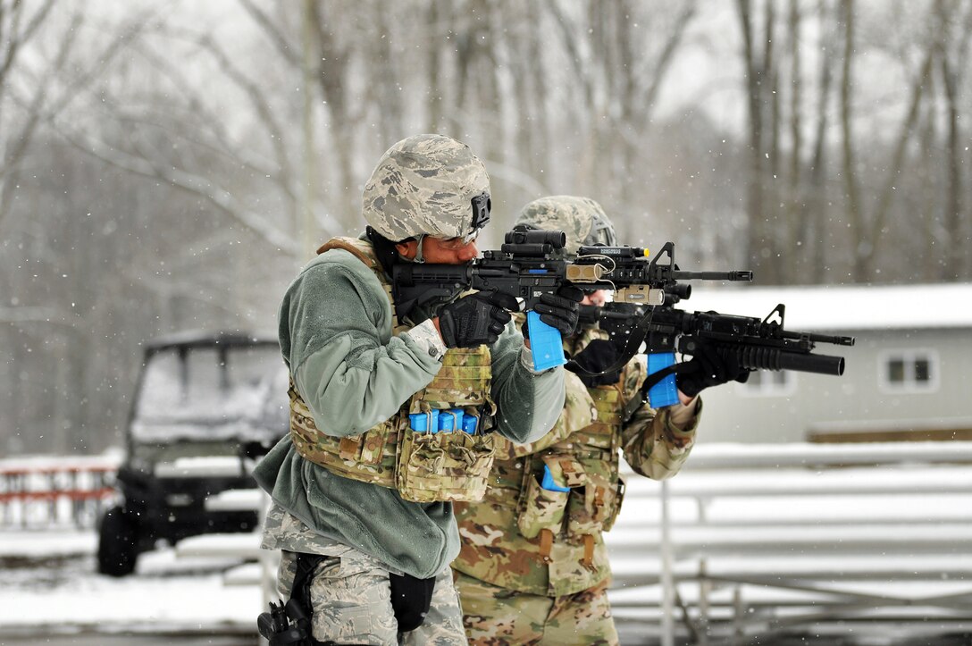 445th Security Forces Squadron Airmen neutralize targets with simulated live rounds during shoot, move, communicate training, Feb. 8, 2020 at the Wright-Patterson Air Force Base Warfighter Training Center.