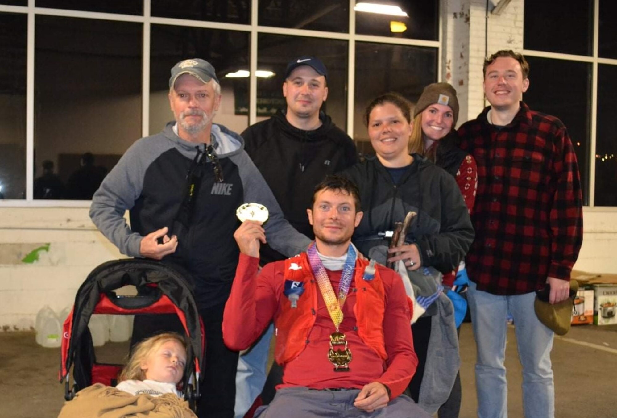 Celebratory photo after Capt. Kyle Imhoff finishes his first 100-mile ultramarathon.