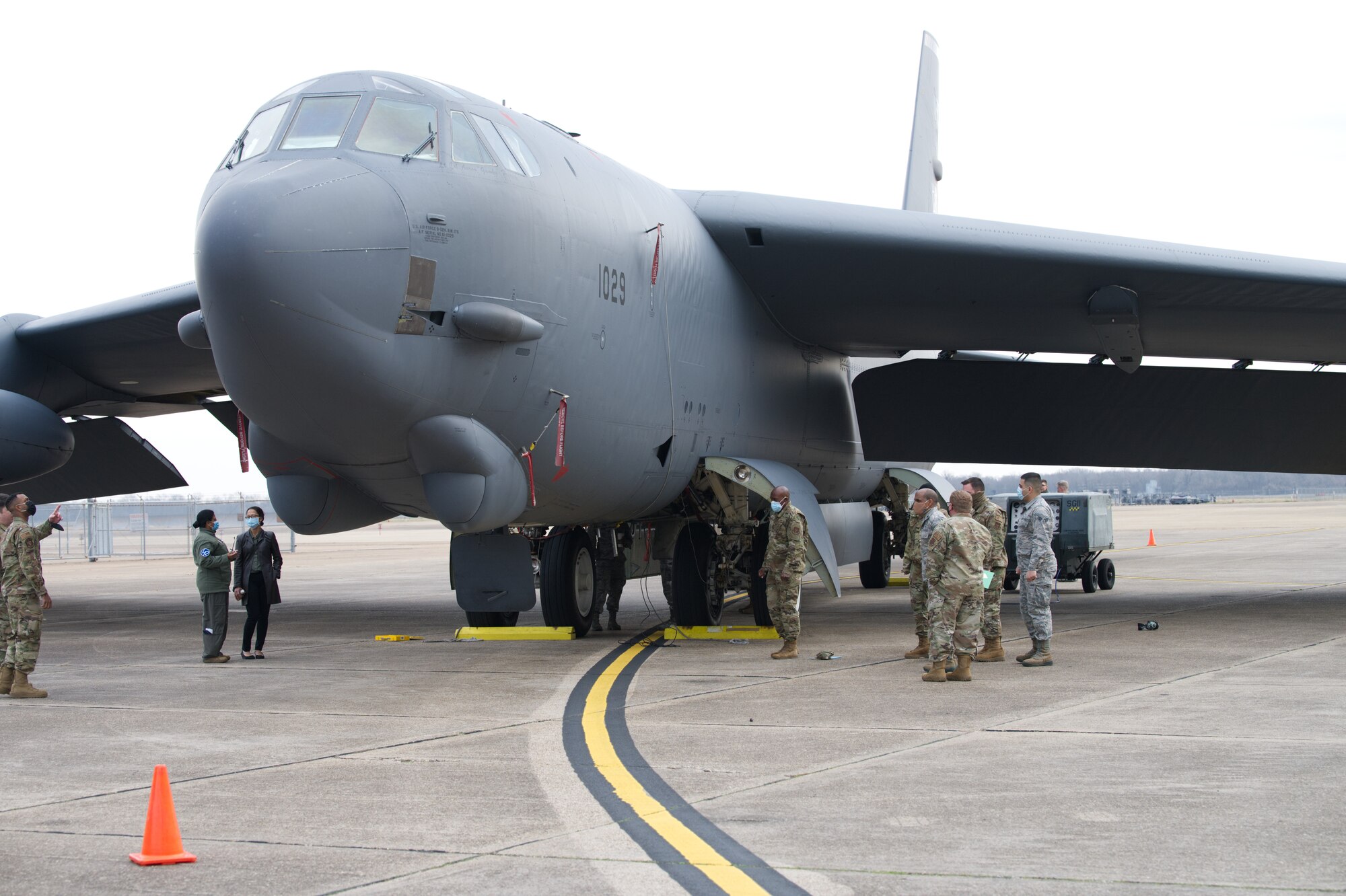 Photo of a B-52 surrounded by Airmen