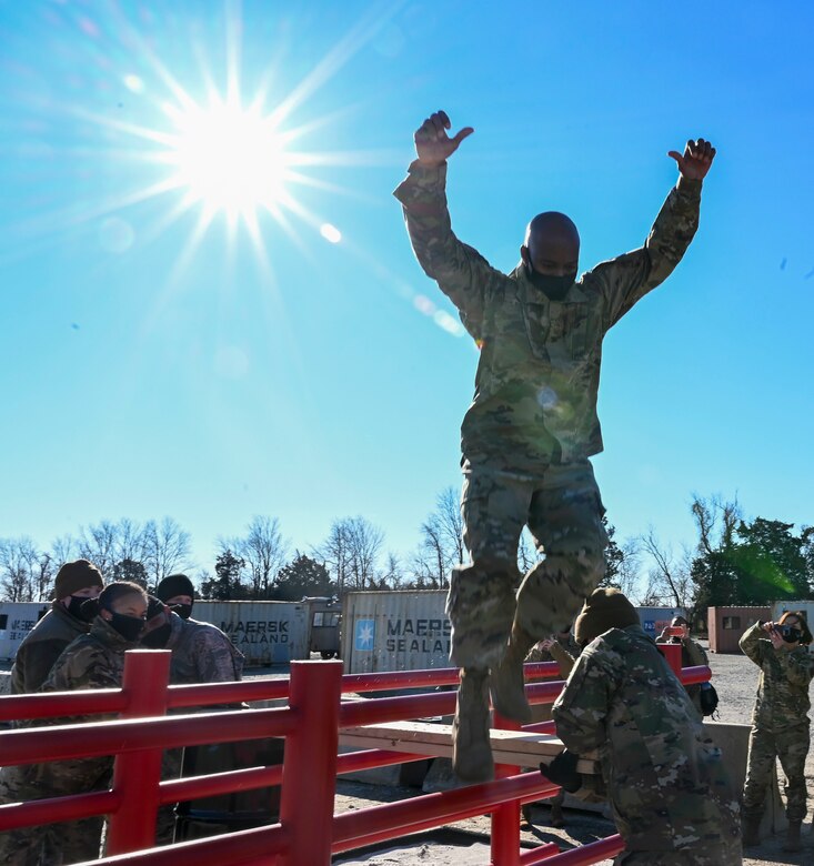 Chief Master Sgt. Mike Perry, Air Force First Sergeant special duty manager, completes a leadership obstacle at the Tactics and Leadership Nexus (TALN) Jan. 7, 2021, on Dover Air Force Base, Delaware. TALN is a scenario-based training facility designed to enhance readiness and develop multi-capable Airmen. (U.S. Air Force photo by Airman 1st Class Cydney Lee)