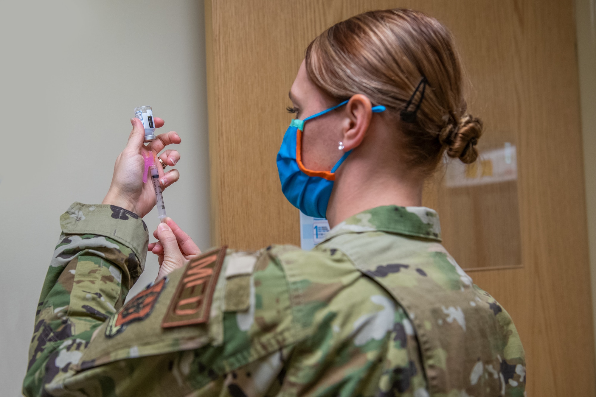 Tech. Sgt. Kelly Cummins, a medical technician in the 419th Medical Squadron, draws COVID-19 vaccines in preparation to administer shots to 419th Fighter Wing reservists, Jan. 9, 2021, at Hill Air Force Base, Utah.