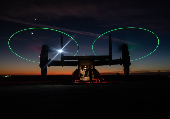 An MV-22 Osprey stages during a night during a Tactical Recovery of Aircraft and Personnel exercise at Marine Corps Base Camp Pendleton, Calif., Dec. 16.
