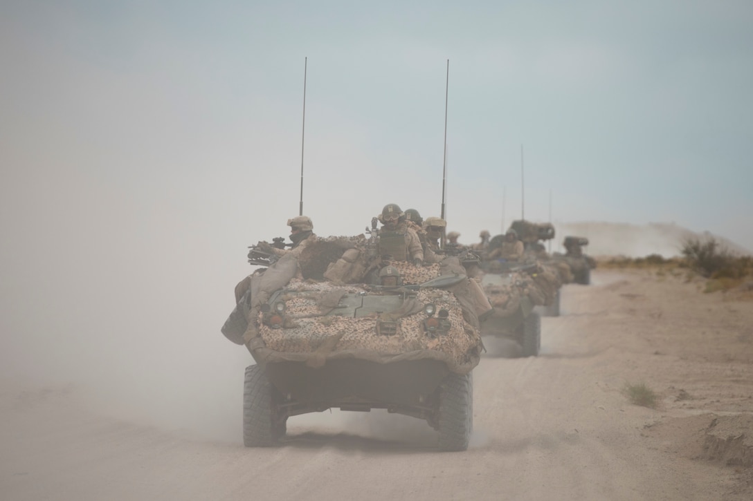 U.S. Marines convoy to defensive positions at Marine Corps Air Ground Combat Center Twentynine Palms, Calif., Dec. 7.