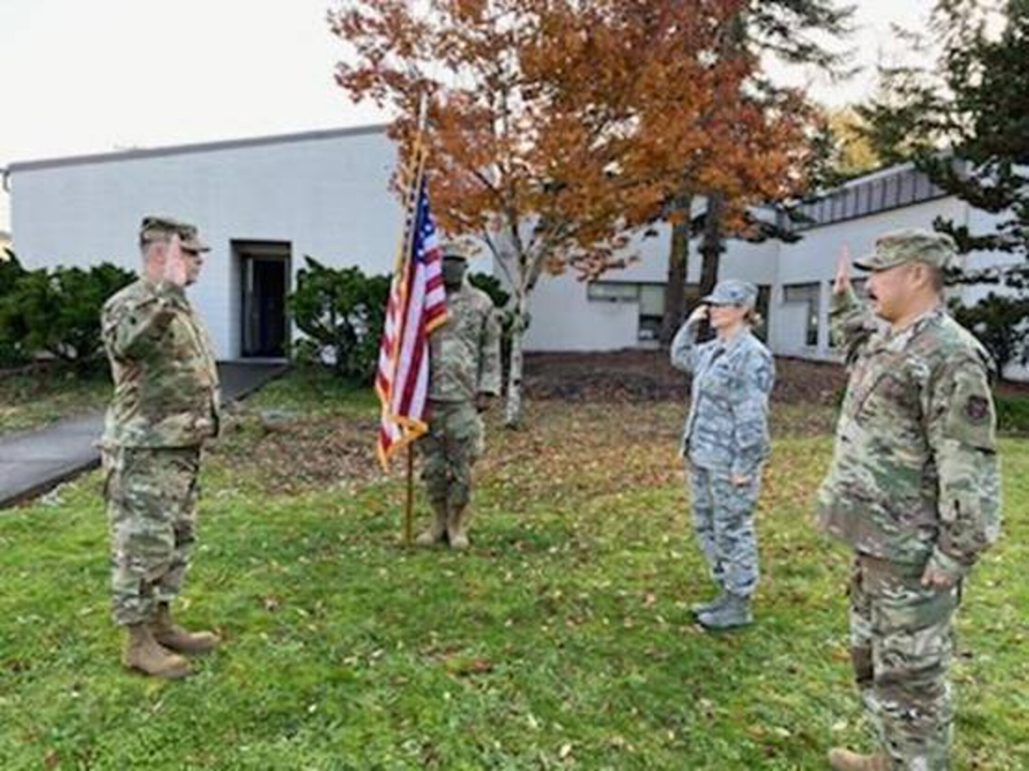 Commander re-enlists two Reserve Citizen Airmen