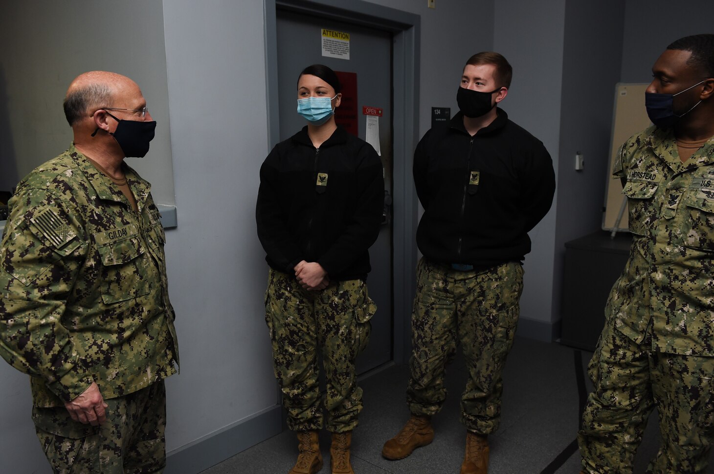 NAVAL SUPPORT ACTIVITY NAPLES, Italy (Jan. 11, 2021) Adm. Mike Gilday, Chief of Naval Operations, left, talks to Sailors during a guided tour of the U.S. Sixth Fleet maritime operations center onboard Naval Support Activity Naples, Italy, Jan. 11, 2021. U.S. Naval Forces Europe and Africa, headquartered in Naples, Italy, conducts the full spectrum of joint and naval operations, often in concert with allied and interagency partners, in order to advance U.S. national interests, security and stability in Europe and Africa. (U.S. Navy photo by Mass Communication Specialist 1st Class Debra Thomas/ Released)