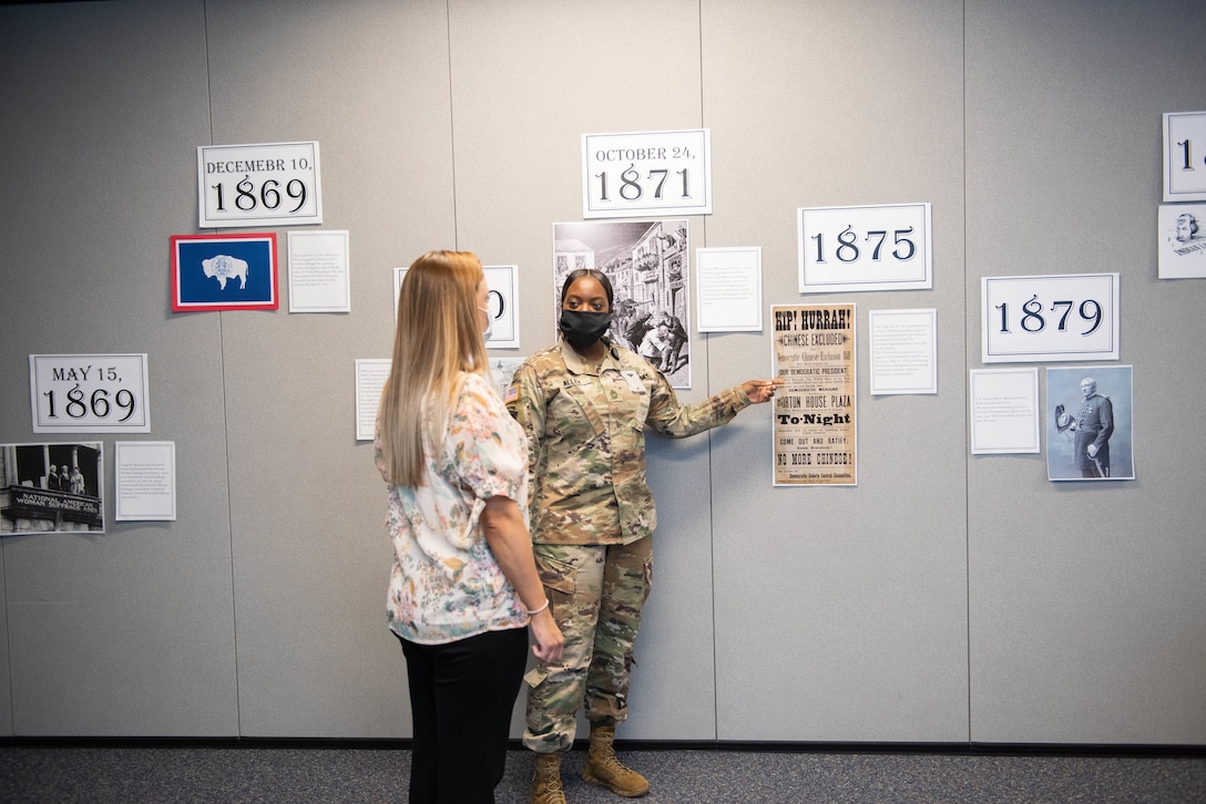 MSG Shantae Allen describes some key timeline events on the road to voting rights for other disenfranchised groups of Americans. This was part of the display developed by the Middle East District's Federal Women's Program Committee to mark Women's Equality Day in August.