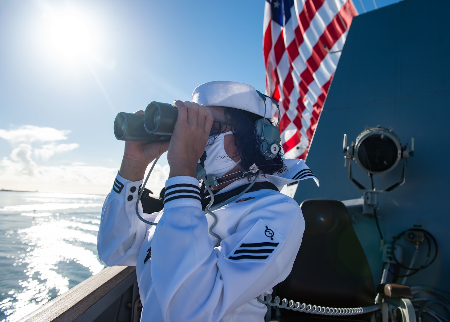 Sailor stands lookout on USS William P. Lawrence