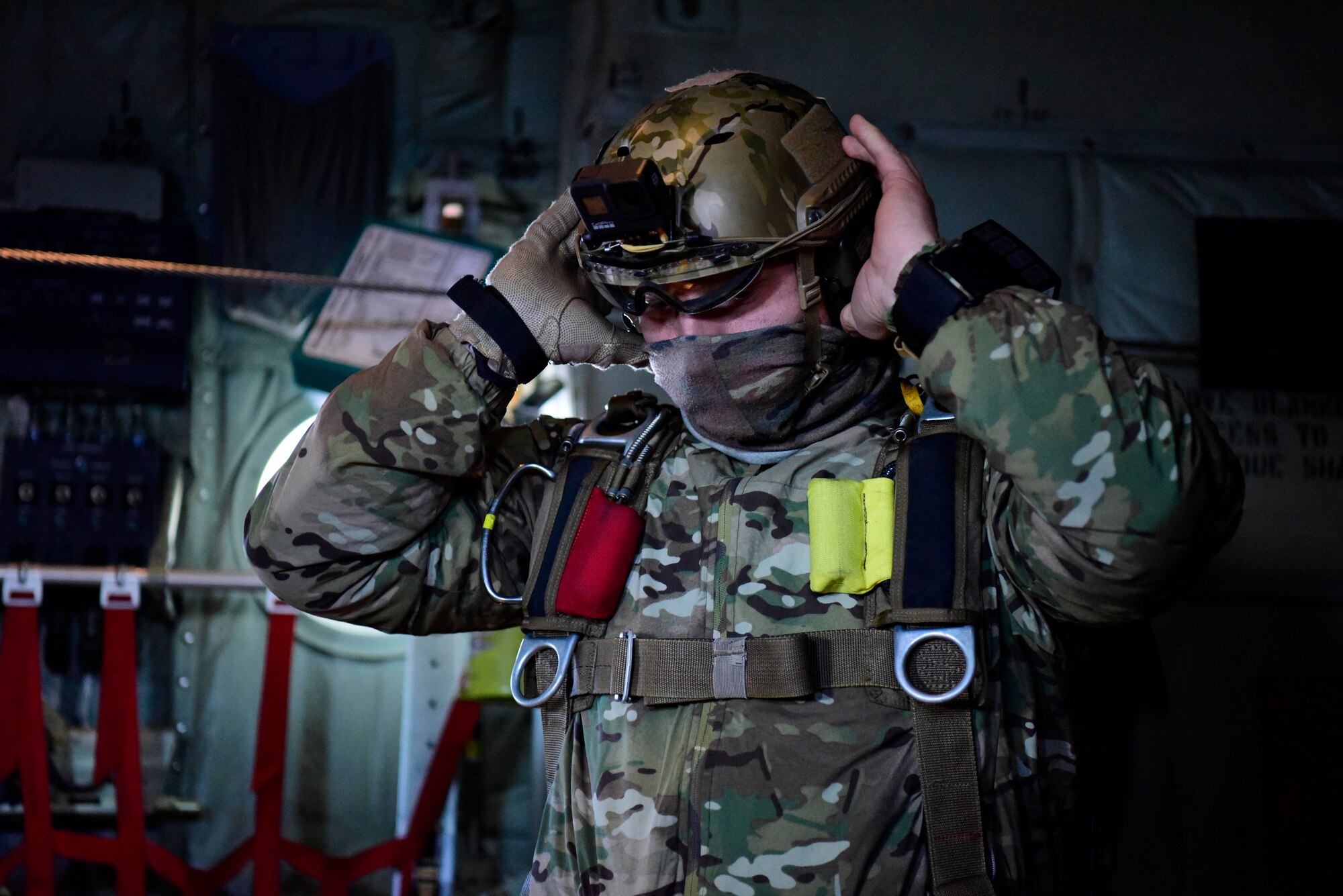Soldier securing his helmet