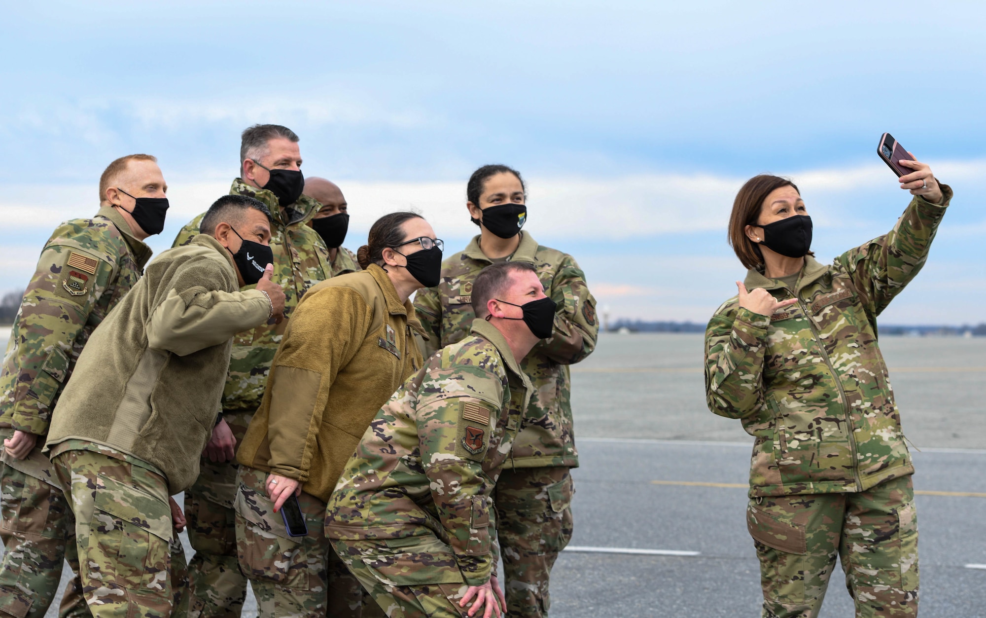 Chief Master Sgt. of the Air Force JoAnne S. Bass takes a selfie with Dover Air Force Base senior leaders as she ends a two-day visit at Dover Air Force Base, Del., Jan. 8, 2021. The office of the Chief Master Sergeant of the Air Force represents the highest enlisted level of leadership, provides direction for the enlisted corps and represents their interests to the American public and all levels of government. (U.S. Air Force photo by Airman 1st Class Stephani Barge)