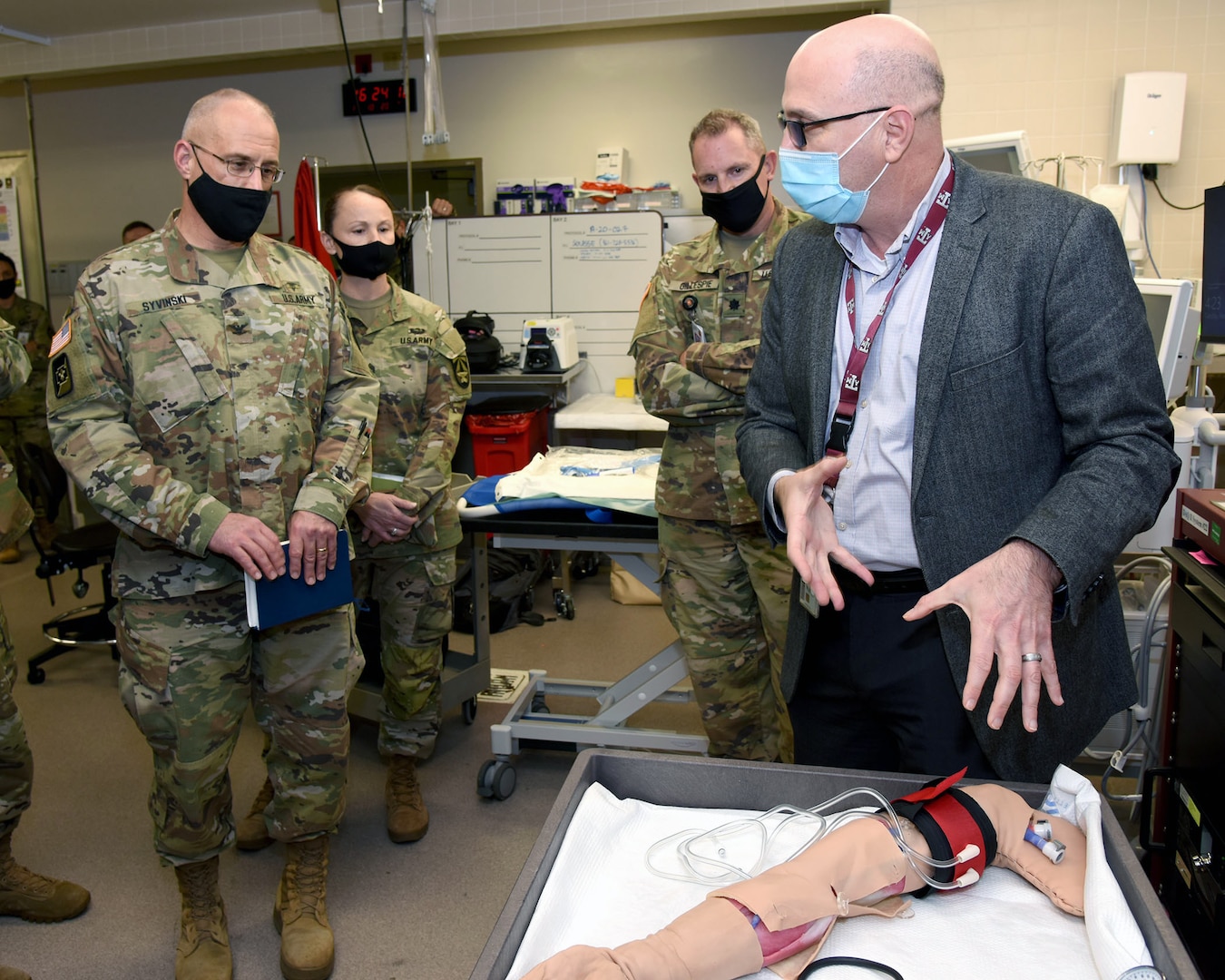 Jose Salinas, Ph.D. (right), chief of Engineering Processes and Product Development at the U.S. Army Institute of Surgical Research at Joint Base San Antonio-Fort Sam Houston, explains the research his team is conducting to Col. Bruce Syvinski (left), director of Medical Capability Development Integration Directorate at the Futures and Concepts Center at JBSA-Fort Sam Houston.