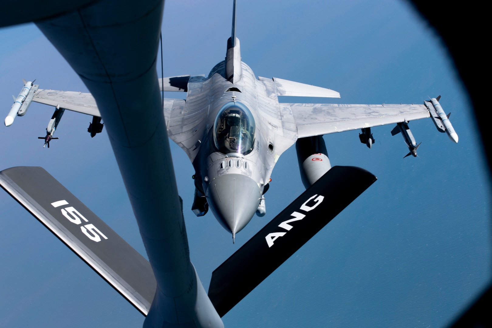 A U.S. Air Force F-16C Falcon from the 96th Test Wing prepares for in-flight refueling from a 155th Air Refueling Wing KC-135 Stratotanker during exercise Emerald Flag over the Gulf of Mexico, Dec. 3, 2020. More than 25 agencies participated in the exercise, hosted at Eglin Air Force Base, Fla. Emerald Flag combined ground, space, cyber, and air platforms for joint test and experimentation.