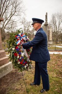 Col. Steven Hefferon, commander of the 107th Mission Support Group, Niagara Falls Air Reserve Station, New York Air National Guard, presents a wreath at the grave of Millard Fillmore, the 13th president, in Buffalo, N.Y., Jan. 7, 2021. The 107th Attack Wing has been honoring the former president with a wreath-laying each year on his birthday for more than 30 years.
