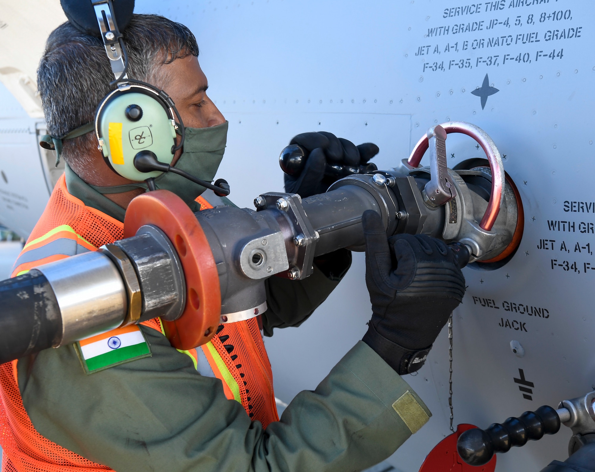 A member of the Indian air force 28th Wing attaches a fuel hose to an Indian air force C-17 Globemaster III at Dover Air Force Base, Delaware, Nov. 20, 2020. The U.S. strengthens its international partnerships through foreign military sales. Dover AFB actively supports $3.5 billion worth of FMS due to its strategic location and 436th Aerial Port Squadron, the largest aerial port in the Department of Defense. As the world’s oldest and largest democracies, the United States and India share a commitment to freedom, human rights and rule of law. (U.S. Air Force photo by Senior Airman Christopher Quail)