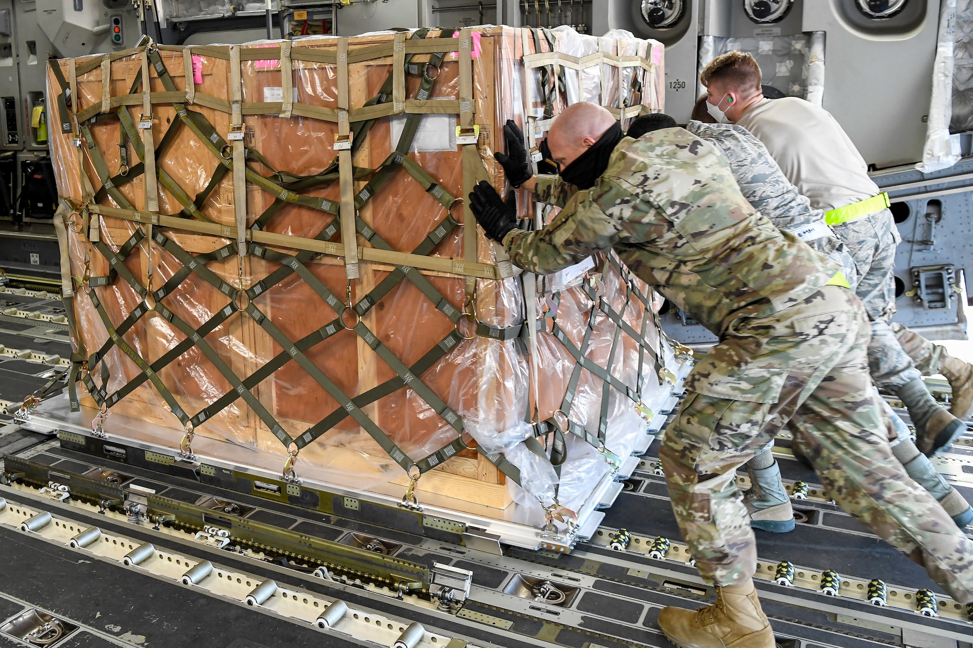 Airmen from the 436th Aerial Port Squadron load cargo onto an Indian air force C-17 Globemaster III at Dover Air Force Base, Delaware, Nov. 20, 2020. The U.S. strengthens its international partnerships through foreign military sales. Dover AFB actively supports $3.5 billion worth of FMS due to its strategic location and 436th Aerial Port Squadron, the largest aerial port in the Department of Defense. As the world’s oldest and largest democracies, the United States and India share a commitment to freedom, human rights and rule of law. (U.S. Air Force photo by Senior Airman Christopher Quail)