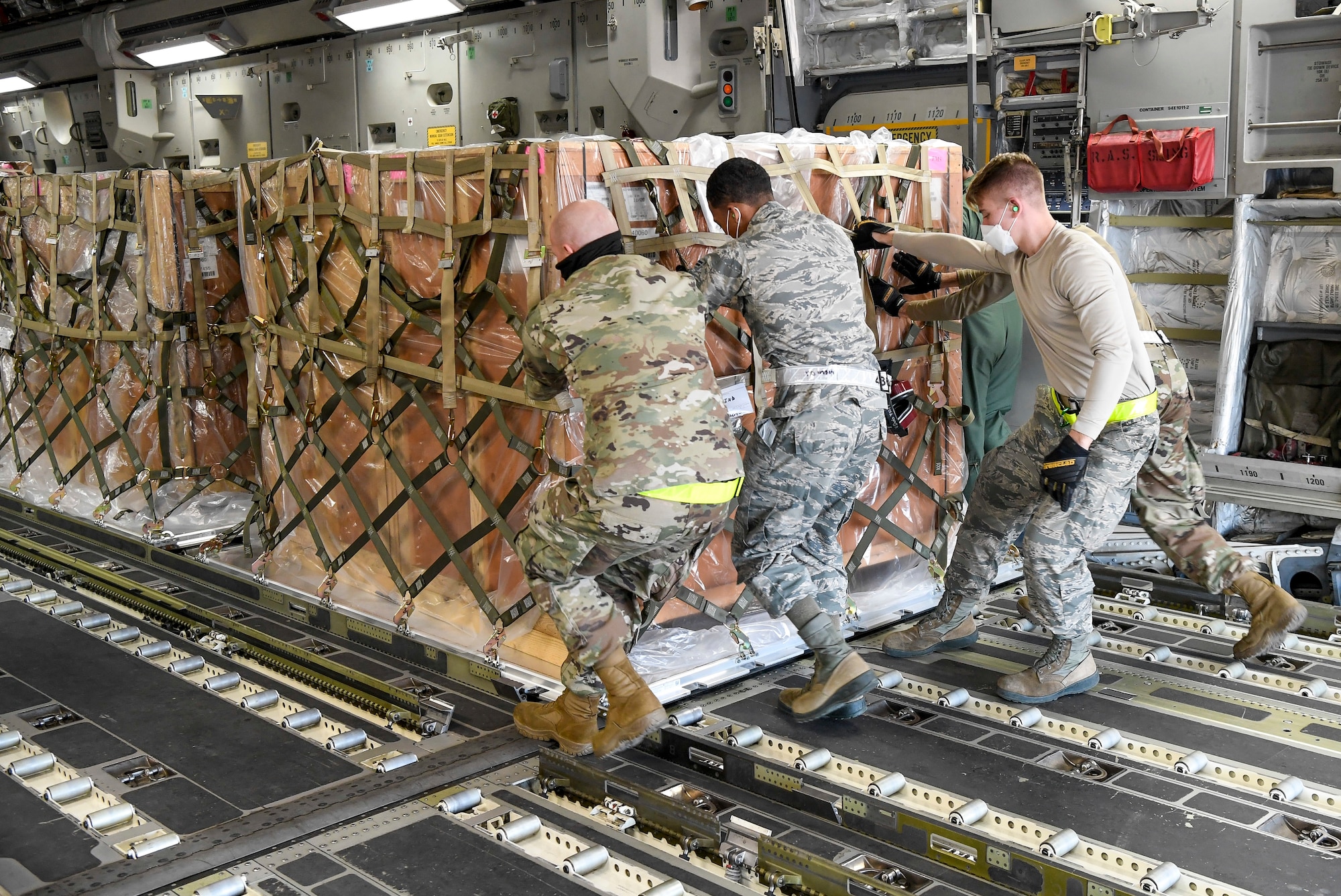 Airmen from the 436th Aerial Port Squadron load cargo onto an Indian air force C-17 Globemaster III at Dover Air Force Base, Delaware, Nov. 20, 2020. The U.S. strengthens its international partnerships through foreign military sales. Dover AFB actively supports $3.5 billion worth of FMS due to its strategic location and 436th Aerial Port Squadron, the largest aerial port in the Department of Defense. As the world’s oldest and largest democracies, the United States and India share a commitment to freedom, human rights and rule of law. (U.S. Air Force photo by Senior Airman Christopher Quail)