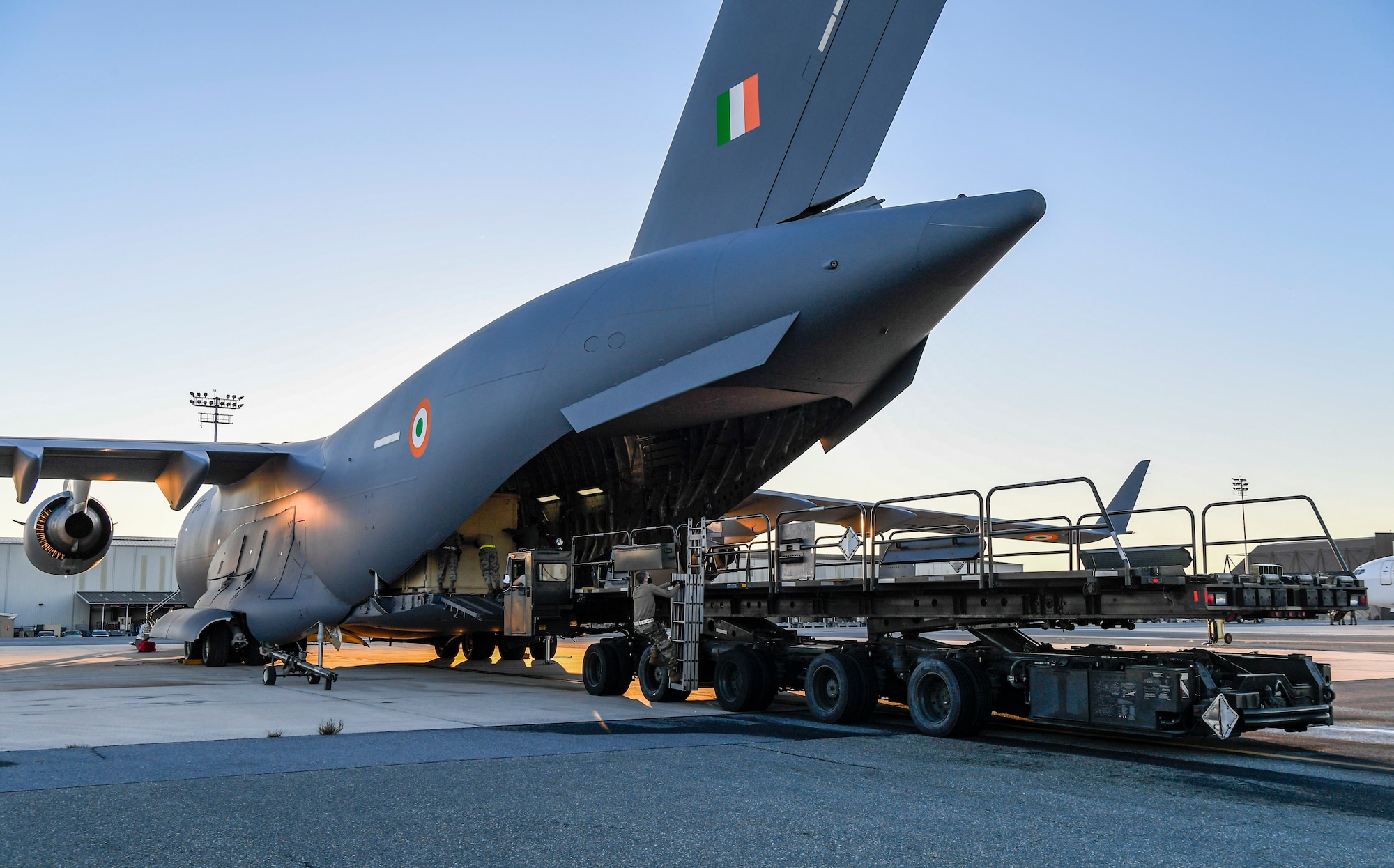 Airmen from the 436th Aerial Port Squadron load cargo onto an Indian air force C-17 Globemaster III at Dover Air Force Base, Delaware, Nov. 20, 2020. The U.S. strengthens its international partnerships through foreign military sales. Dover AFB actively supports $3.5 billion worth of FMS due to its strategic location and 436th Aerial Port Squadron, the largest aerial port in the Department of Defense. As the world’s oldest and largest democracies, the United States and India share a commitment to freedom, human rights and rule of law. (U.S. Air Force photo by Senior Airman Christopher Quail)