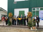 Department of Agriculture Undersecretary Dr. William Medrano, Director of the Bureau of Animal Industry Dr. Ronnie Domingo, and U.S. Embassy staff participate in the ribbon-cutting ceremony in Tuguegarao City