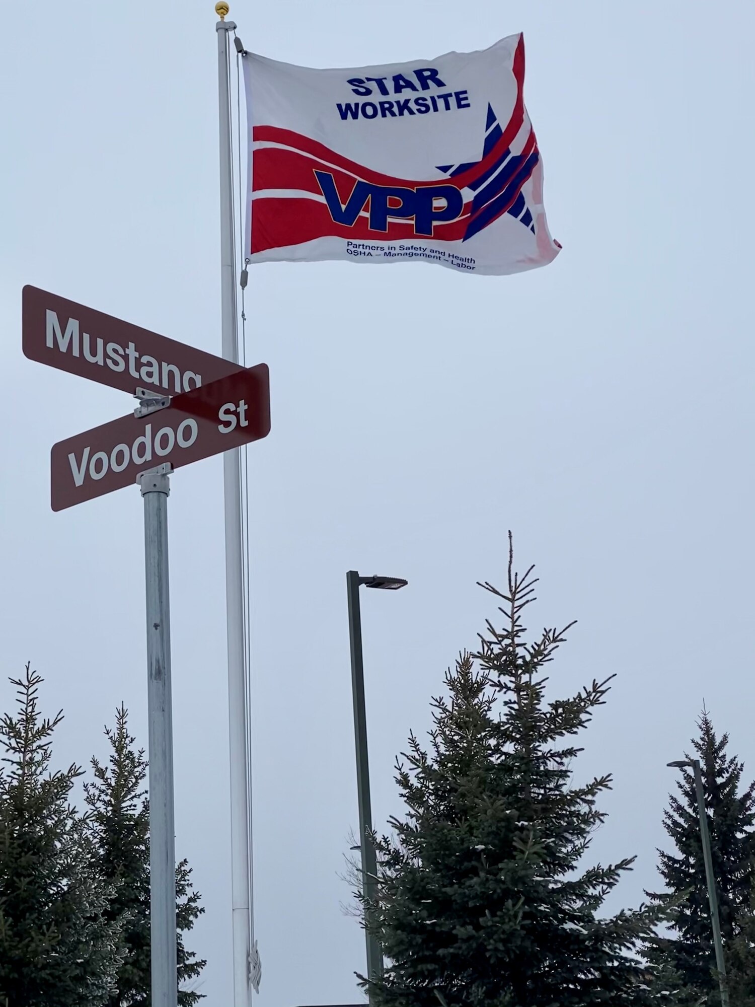 On the corner of Mustang Drive and Voodoo Street at the 148th Fighter Wing, the Voluntary Protection Program (VPP) flag flies proudly to display the wing’s STAR rating since 2008.