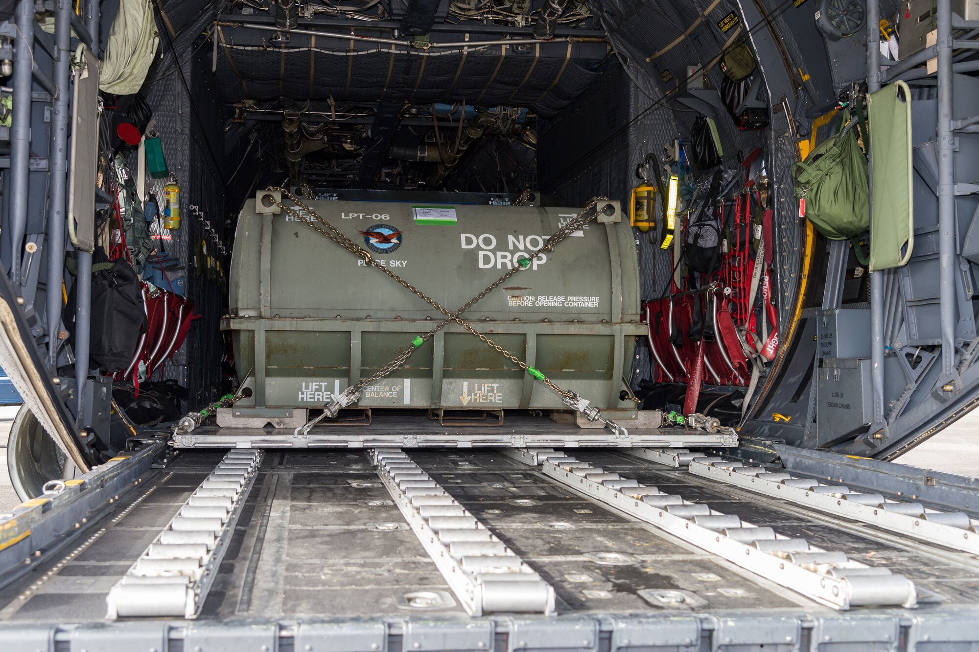 Cargo on a Polish air force C-130E Hercules sits ready to be unloaded by Airmen from the 436th Aerial Port Squadron Dec. 17, 2020, at Dover Air Force Base, Delaware, as part of a foreign military sales mission. The United States and Poland have enjoyed warm bilateral relations since 1989. Poland is a stalwart NATO ally, and both the U.S. and Poland remain committed to the regional security and prosperity of Europe. Due to its strategic location, Dover AFB supports approximately $3.5 billion worth of foreign military sales annually. (U.S. Air Force photo by Roland Balik)