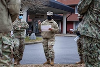 JOINT BASE LANGLEY-EUSTIS (January 11, 2021) Army Lt. Col. Tathetra Joseph, assigned to Joint Task Force Civil Support’s Surgeon General’s office, briefs command members before they are administered the COVID-19 vaccination at McDonald Army Health Center.