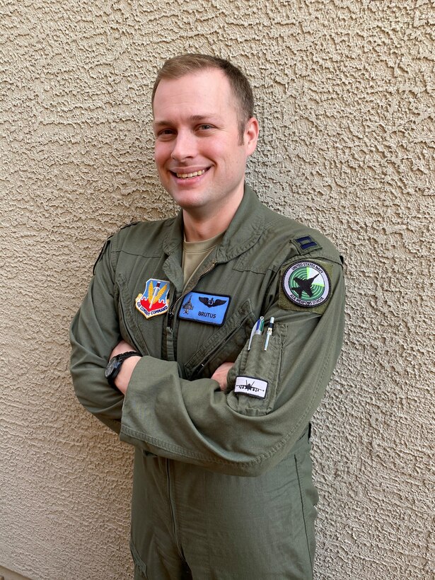 A captain poses for a photo.