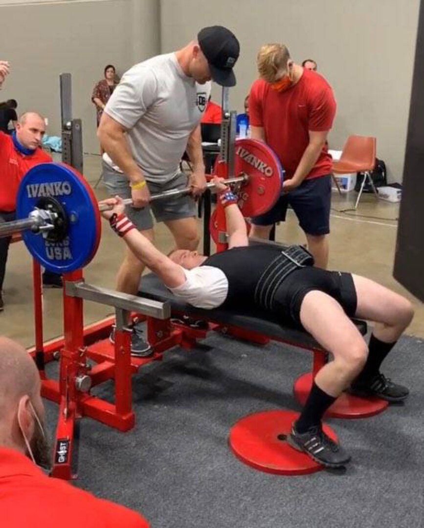Master Sgt. Daniel Bedford, Air Force Recruiting Service National Events program manager, prepares to pump up a gold medal lift in the bench press during the USPA (United State Powerlifting Association) 2020 Texas State Bench Press Championship.