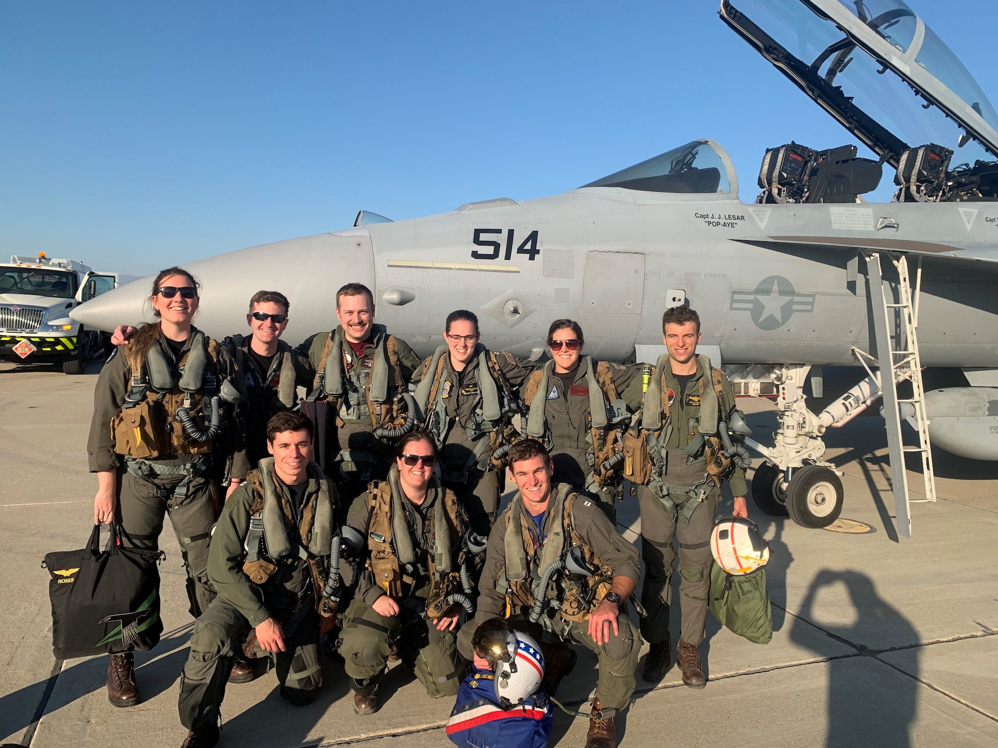 U.S. Air Force Capt. Aaron “Brutus” Tindall, 390th Electronic Combat Squadron EA-18G weapons officer, poses with naval aircrew and electronic warfare officers Oct. 29, 2020, at the Point Mugu Naval Air Station, California. Tindall is the first Airman to graduate from the Navy’s Airborne Electronic Attack weapons school, making him a subject matter expert in AEA and the EA-18G Growler.
