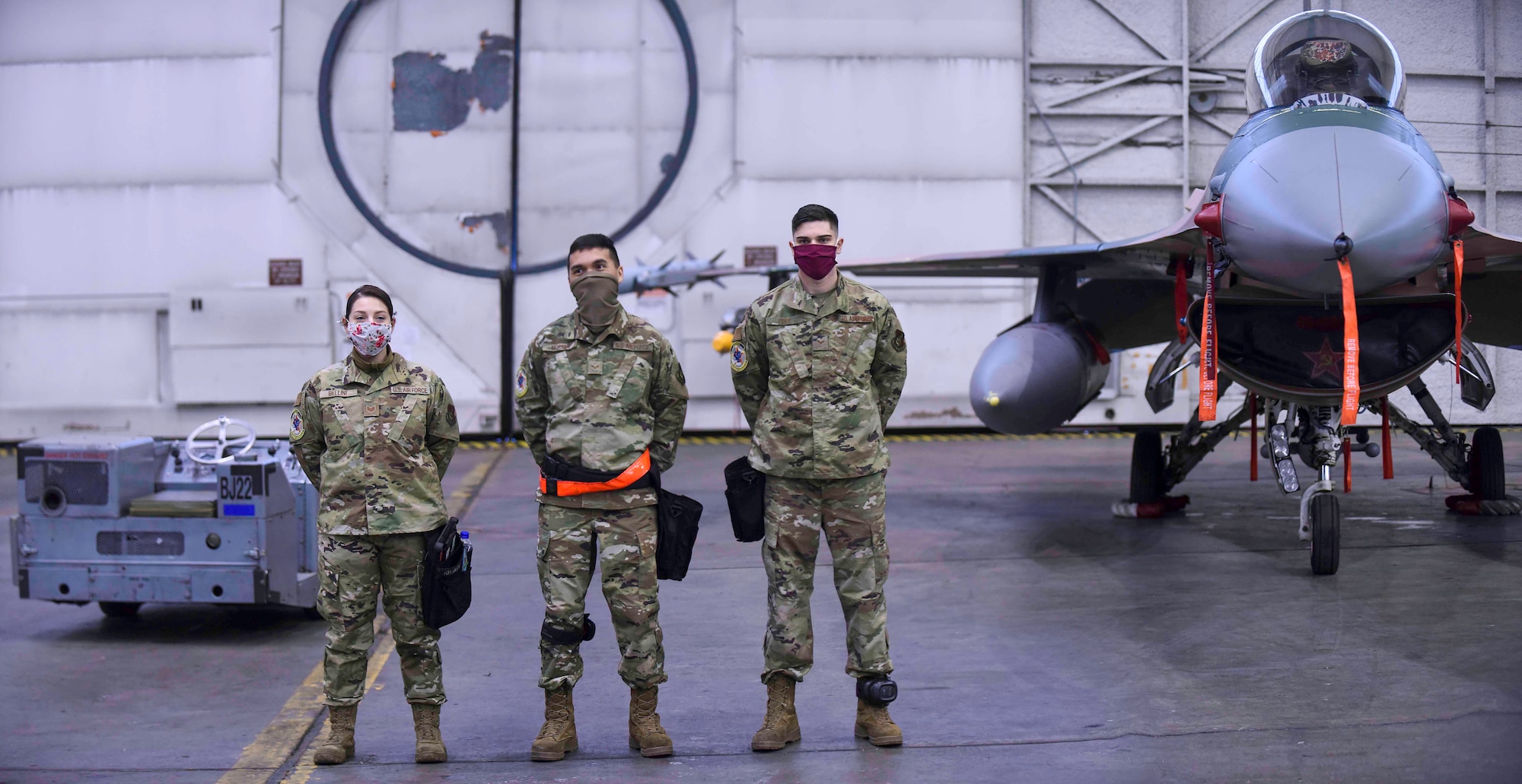 Two load crews prepare to test their abilities in a load crew competition, Jan. 8, 2021, on Eielson AFB, Alaska. The left team represented the new 356th Maintenance Unit and the right team represented the 18th Maintenance Unit and they claimed victory. (U.S. Air Force photo by Senior Airman Keith Holcomb)