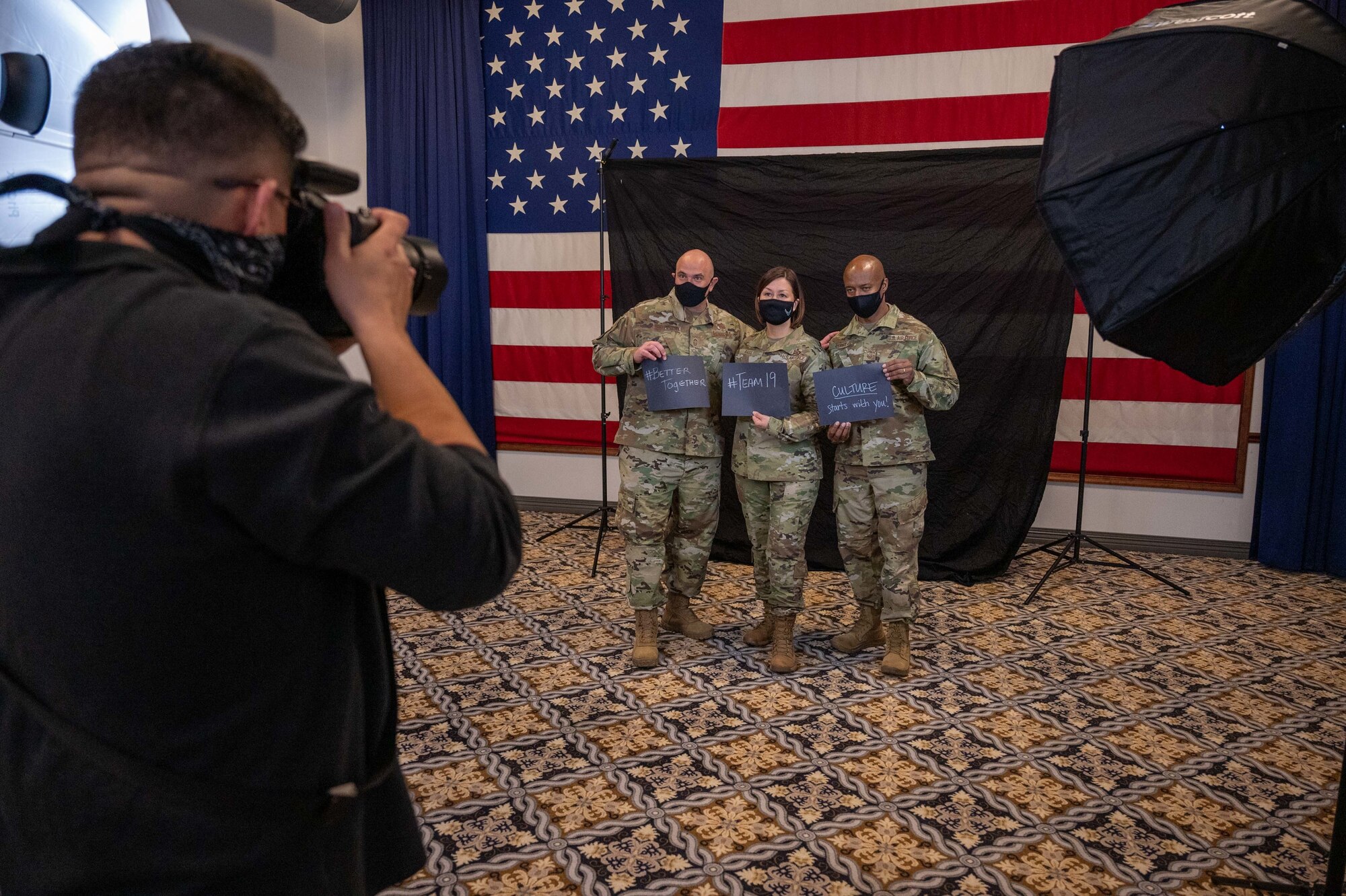 Chief Master Sgt. of the Air Force JoAnne S. Bass, Chief Master Sgt. Jalil Samacarchin, Air Force Aircraft Systems career field manager, and Chief Master Sgt. Mike Perry, Air Force First Sergeant special duty manager, pose for a black-and-white photo during a visit to Dover Air Force Base, Jan. 8, 2021. Airmen were invited to pose for black-and-white photos to reflect on the importance of diversity. During her visit, Bass gained deeper insight into how the base supports and maintains the morale, welfare and inclusion of Airmen and their families. (U.S. Air Force photo by Airman 1st Class Faith Schaefer)