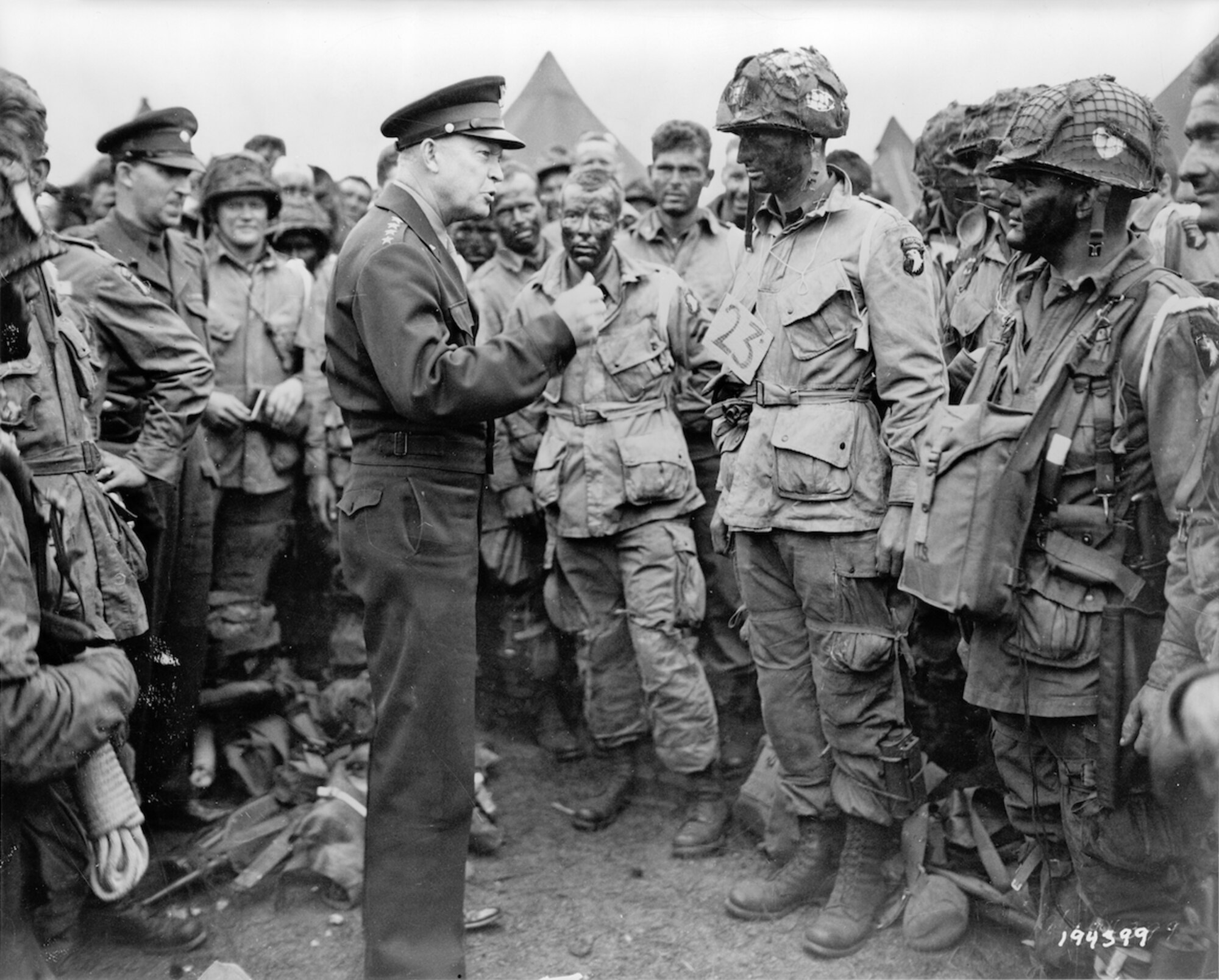 Gen. Dwight D. Eisenhower speaks with members of the 101st Airborne Division at the Royal Air Force Welford Park airfield, England, June 5, 1944. Eisenhower and Winston Churchill visited RAF Welford the night before D Day Operation Overlord during World War II. (Courtesy photo)