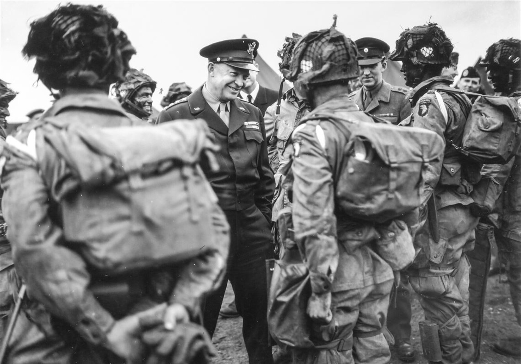 Gen. Dwight D. Eisenhower speaks with members of the 101st Airborne Division at the Royal Air Force Welford Park airfield, England, June 5, 1944. Eisenhower and Winston Churchill visited RAF Welford the night before D Day Operation Overlord during World War II. (Courtesy photo)