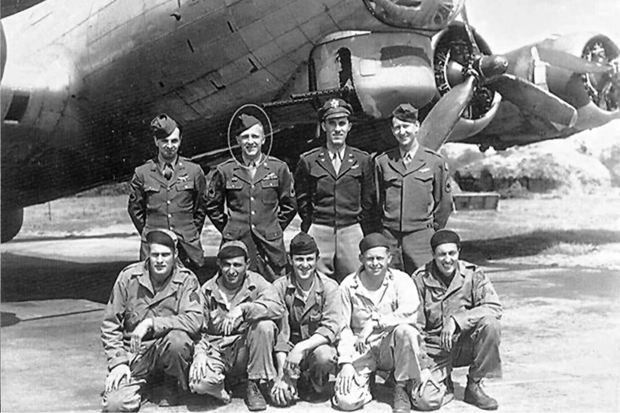 Tech. Sgt. Emil Dihlmann (circled) stands with a B-17 Flying Fortress crew before a mission during World War II. Dihlmann served at RAF Alconbury from 1943 to 1945 and he had such fond memories of his time there that his family asked if they could spread his ashes on the base after he passed away June 27 at the age of 96. (Photo courtesy of Emily Lewney)