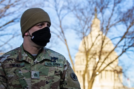 A member of the Delaware National Guard stands watch near the U.S. Capitol in Washington, D.C., Jan. 9, 2021. National Guard Soldiers and Airmen from several other states have traveled to the District of Columbia to support federal and D.C. authorities leading up to the 59th presidential inauguration.