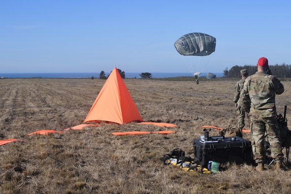 Soldiers assigned to the 346th Theater Aerial Delivery Company, an Army Airborne unit at Joint Forces Training Base Los Alamitos, Calif., participate in tactical, low-level, static line parachute insertion operation training Jan. 9, 2021, at Vandenberg Air Force Base, Calif.
