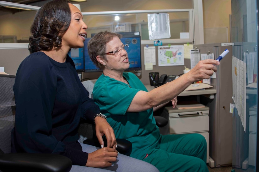 Zekelia Rembert and Anna Moore, virtual health nurse care coordinators, coordinate virtual health projects and outline participating Military Treatment Facilities at the Virtual Medical Center, Fort Sam Houston, Texas, May 16, 2019. Virtual Health nurse care coordinators train virtual health care nurses at varying MTF sites while providing each nurse with 3.5 hours of continued education.