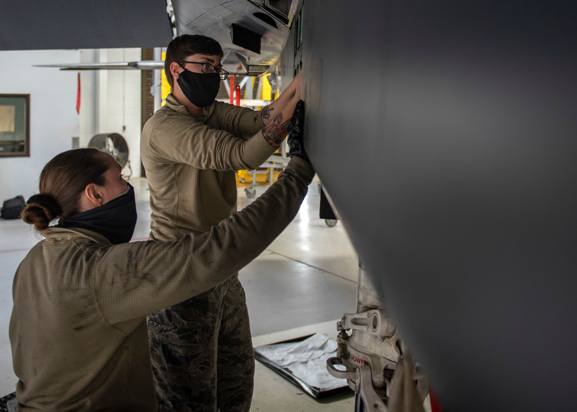 4th Equipment Maintenance Squadron inspection section crew chiefs, inspect a F-15E Strike Eagle at Seymour Johnson Air Force Base, North Carolina Jan. 7, 2021.