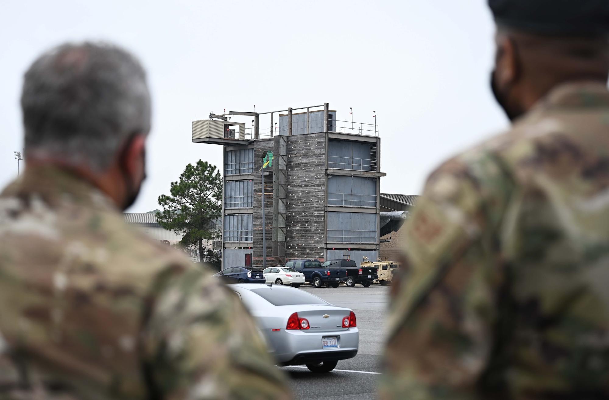 Senior Master Sergeant Jason Ragan, left, 23rd Special Tactics Squadron career enlisted manager, explains the purpose of the unit’s multi-level training facility to Brig. Gen. Roy Collins, director of Security Forces, deputy chief of staff for Logistics, Engineering and Force Protection, during his visit to Hurlburt Field, Fla., Jan. 11, 2021. During the tour, Collins and Chief Master Sgt. Brian Lewis, Security Forces career field manager, were briefed on the Deployed Aircraft Ground Response Element (DAGRE) training process, took part in a lasershot demonstration, and visited the 23rd STS compound for a mission briefing and a walk around the unit’s multilevel training and fitness facilities. (U.S. Air Force photo by Senior Airman Brandon Esau)