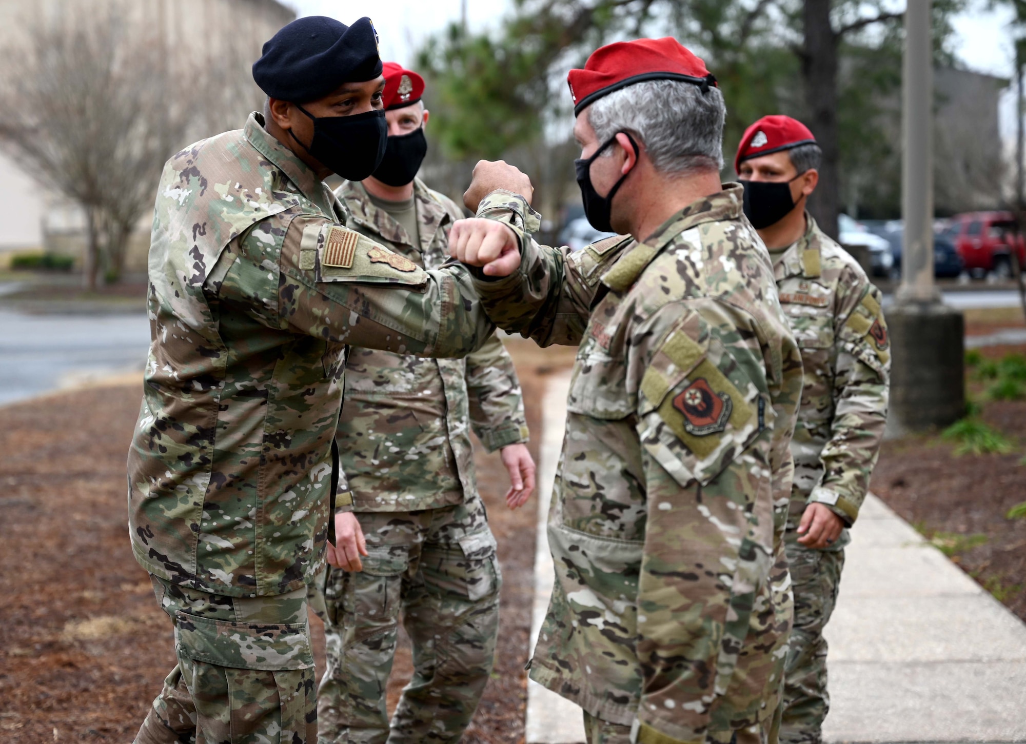 Brigadier General Roy Collins, director of Security Forces, deputy chief of staff for Logistics, Engineering and Force Protection, is greeted by the 23rd Special Tactics Squadron leadership during a visit to Hurlburt Field, Fla., Jan. 11, 2021. During the tour, Collins and Chief Master Sgt. Brian Lewis, Security Forces career field manager, were briefed on the Deployed Aircraft Ground Response Element (DAGRE) training process, took part in a lasershot demonstration, and visited the 23rd STS compound for a mission briefing and a walk around the unit’s multilevel training and fitness facilities. (U.S. Air Force photo by Senior Airman Brandon Esau)