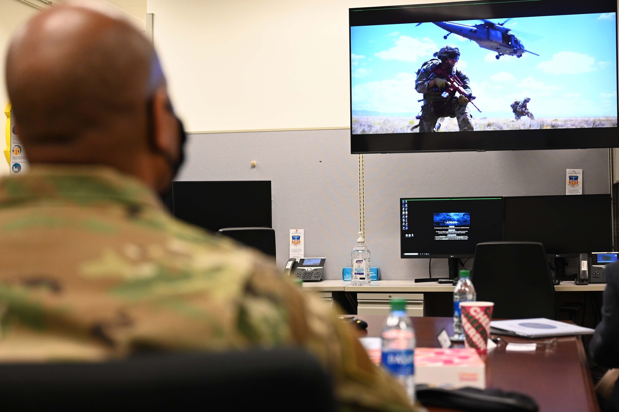 Brigadier General Roy Collins, director of Security Forces, deputy chief of staff for Logistics, Engineering and Force Protection, watches a Deployed Aircraft Ground Response Element (DAGRE) introduction video during his visit to Hurlburt Field, Fla., Jan. 11, 2021. Collins was joined by Chief Master Sgt. Brian Lewis, Security Forces career field manager, and they toured the 371th Special Operations Combat Training Squadron which included a lasershot demonstration, a Deployed Aircraft Ground Response Element (DAGRE) training brief, and  a tour of the 23rd Special Tactics Squadron’s facilities. (U.S. Air Force photo by Senior Airman Brandon Esau)