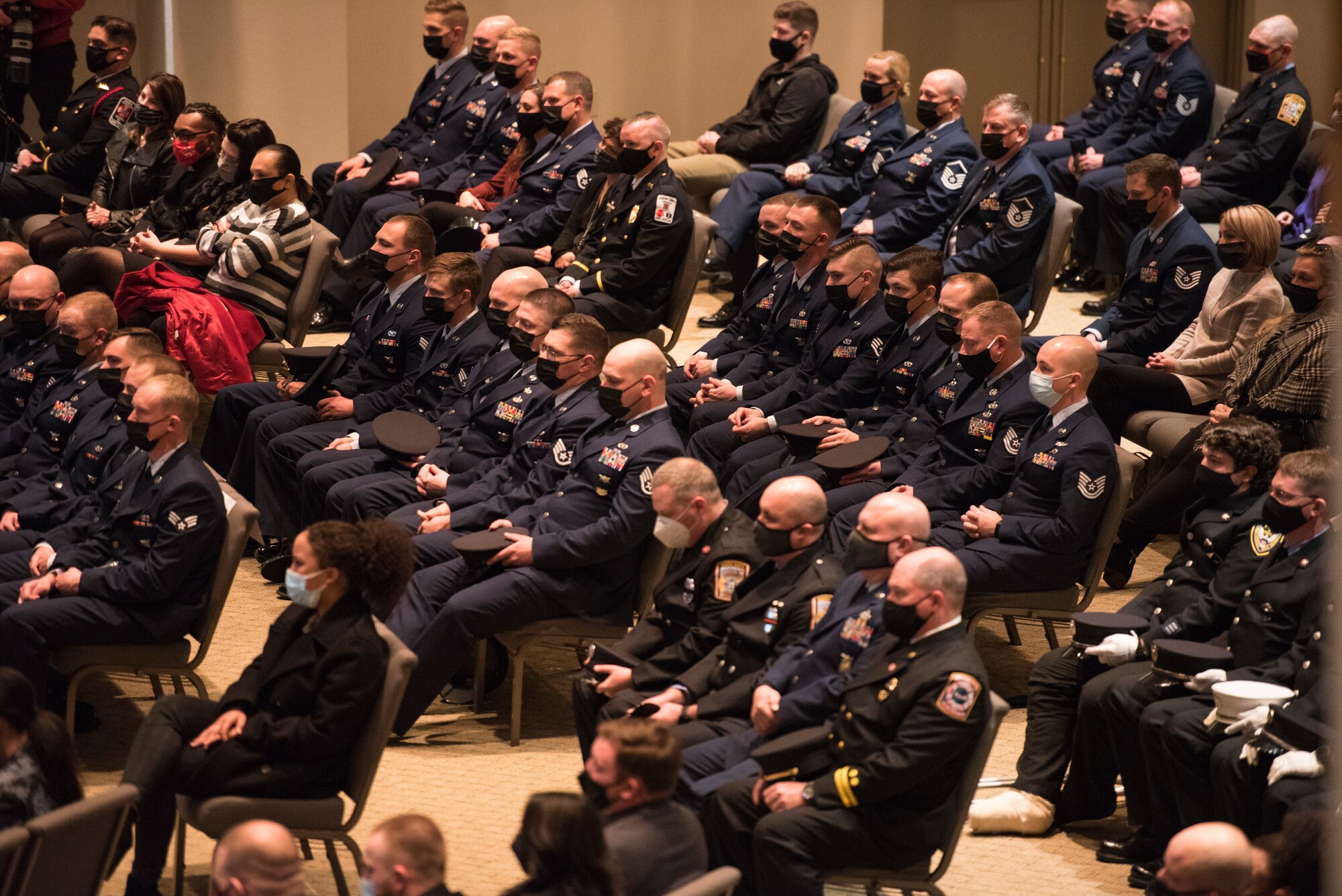 Airmen and firefighters attend the funeral service of Senior Airman Logan Young at Victory Church in Winchester, Va., Jan. 7, 2021. Young was a firefighter for the 167th Civil Engineering Squadron and was killed while battling an off-base fire on Dec. 27, 2020.