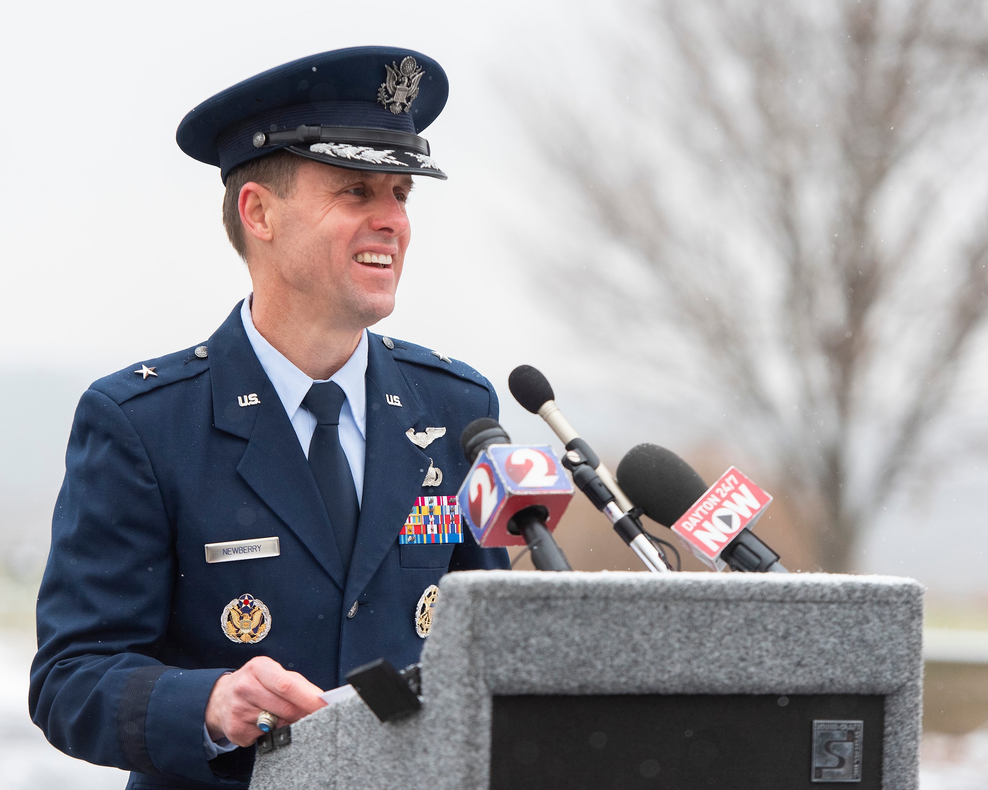 Brig. Gen. John Newberry, Air Force Life Cycle Management Center Bomber Directorate executive officer, is the guest speaker at the annual anniversary of first powered flight ceremony, Dec. 17, 2020, at the Wright Brothers Memorial on Wright-Patterson Air Force Base, Ohio. Newberry talked of how modern aircraft built on the technology developed by the Wright brothers. (U.S. Air Force photo by R.J. Oriez)