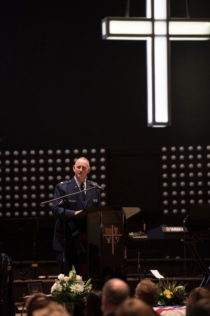 167th Airlift Wing Chaplain, Maj. Ronald Faith, speaks during the funeral service for Senior Airman Logan Young, a firefighter for the 167th Civil Engineering Squadron, at Victory Church, Winchester, Va., Jan. 7, 2021. Young died battling an off-base barn fire on Dec. 27, 2020.